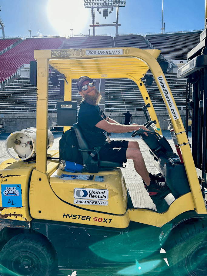 employee driving a forklift