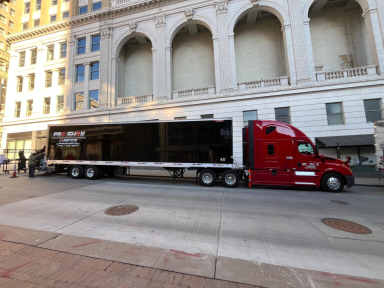 unloading equipment from semi-truck