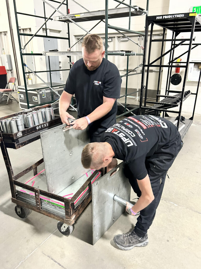 employees assembling equipment